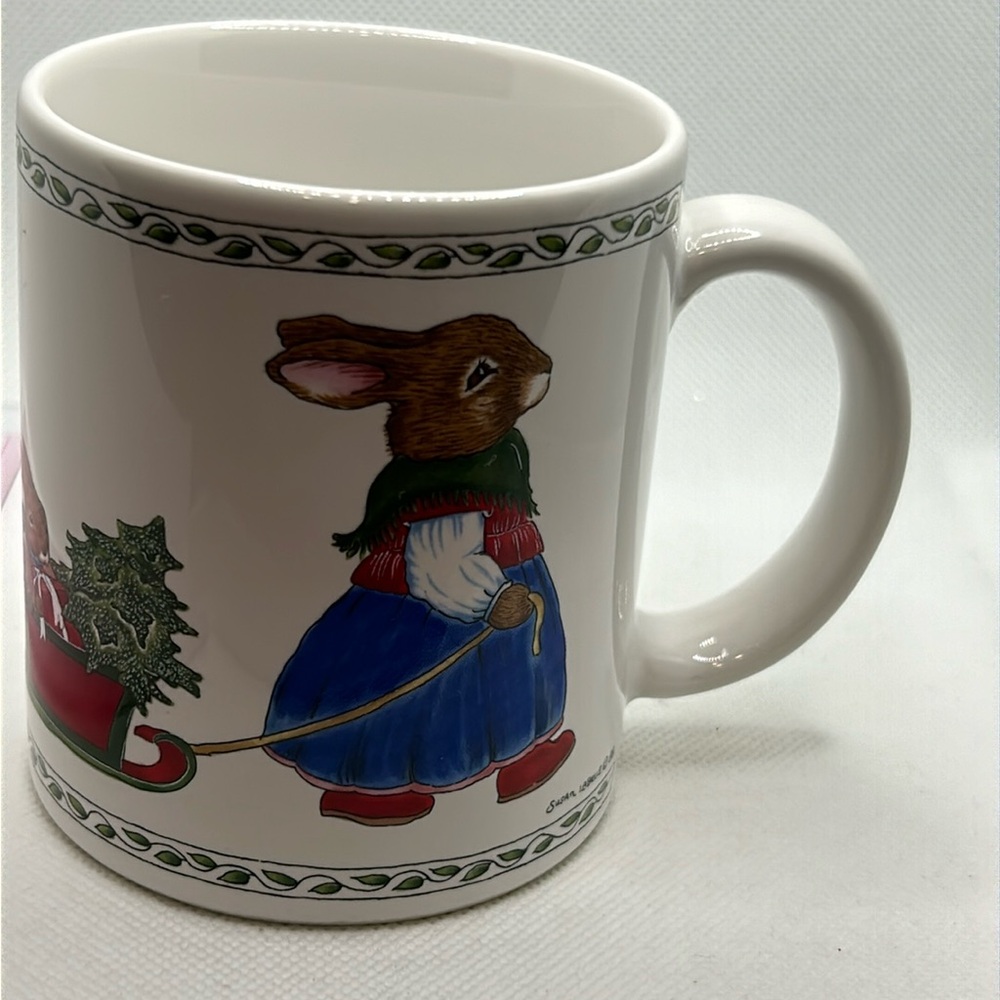 Susan LaBelle 1986 Bunny Christmas mug; has imperfection in glaze,